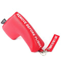 Red blade-style golf putter cover with "Remove Before Flight" keychain tag