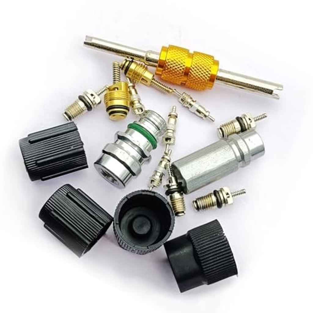 Air conditioning valve core kit with brass coupler, metal cores, and black rubber covers