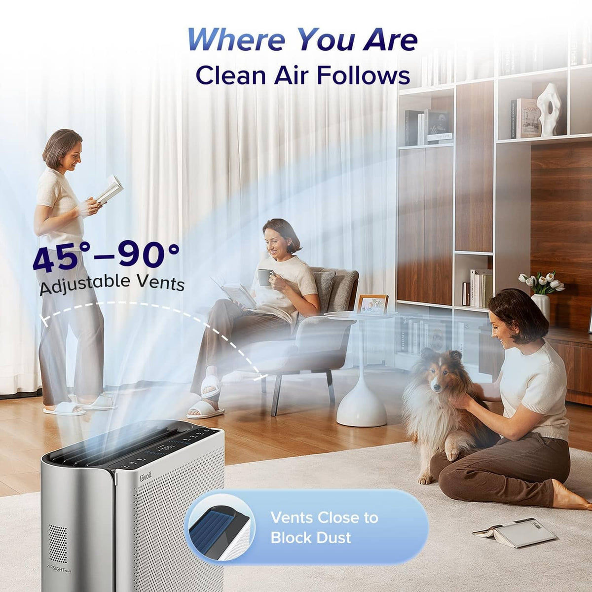 Silvery grey air purifier on floor with perforated panel and black top vents