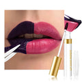 Two-tone plum-red matte lip stain on lips with white applicator and gold cap