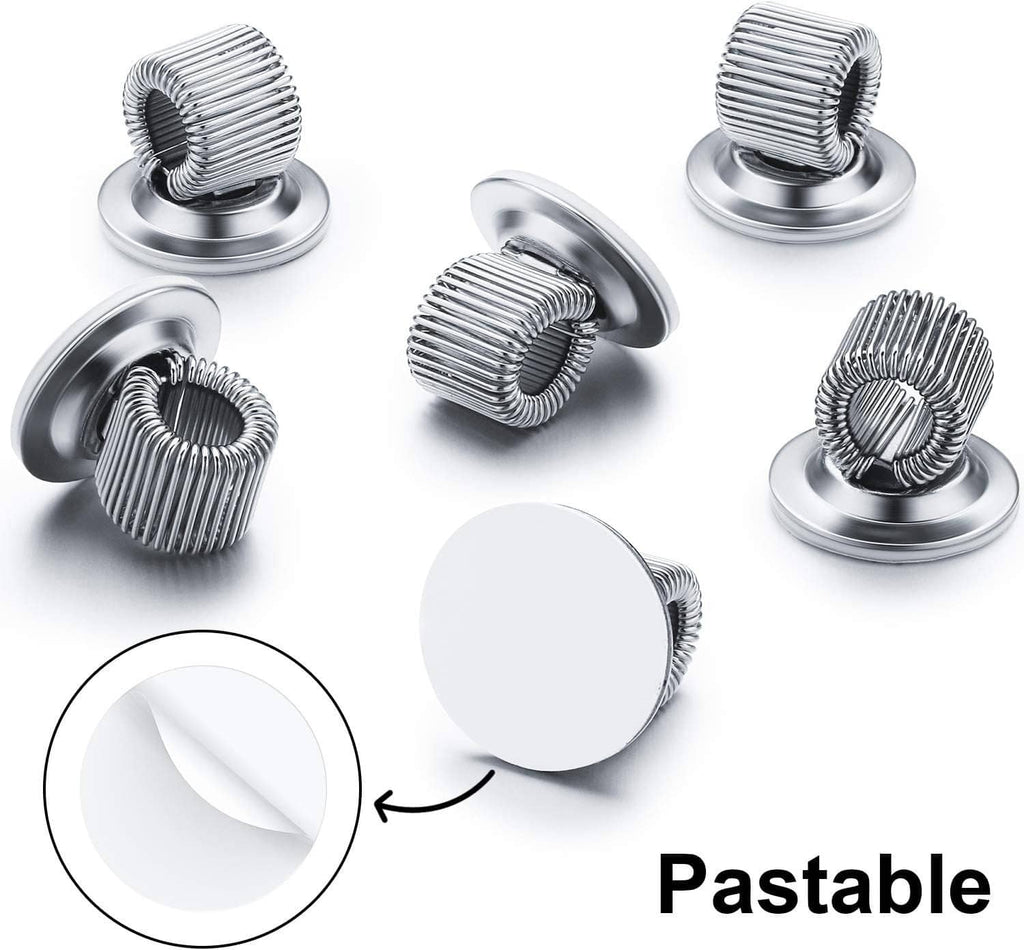 Assorted silver pen holder clips with coiled spring heads on round bases, angled view