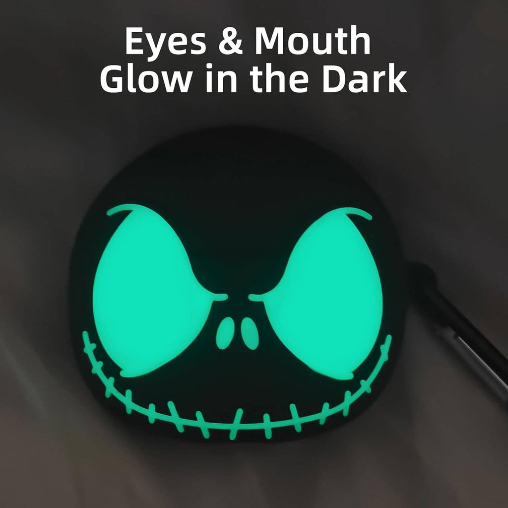 Black earbuds case cover showing glowing green eyes and mouth detail in dark look