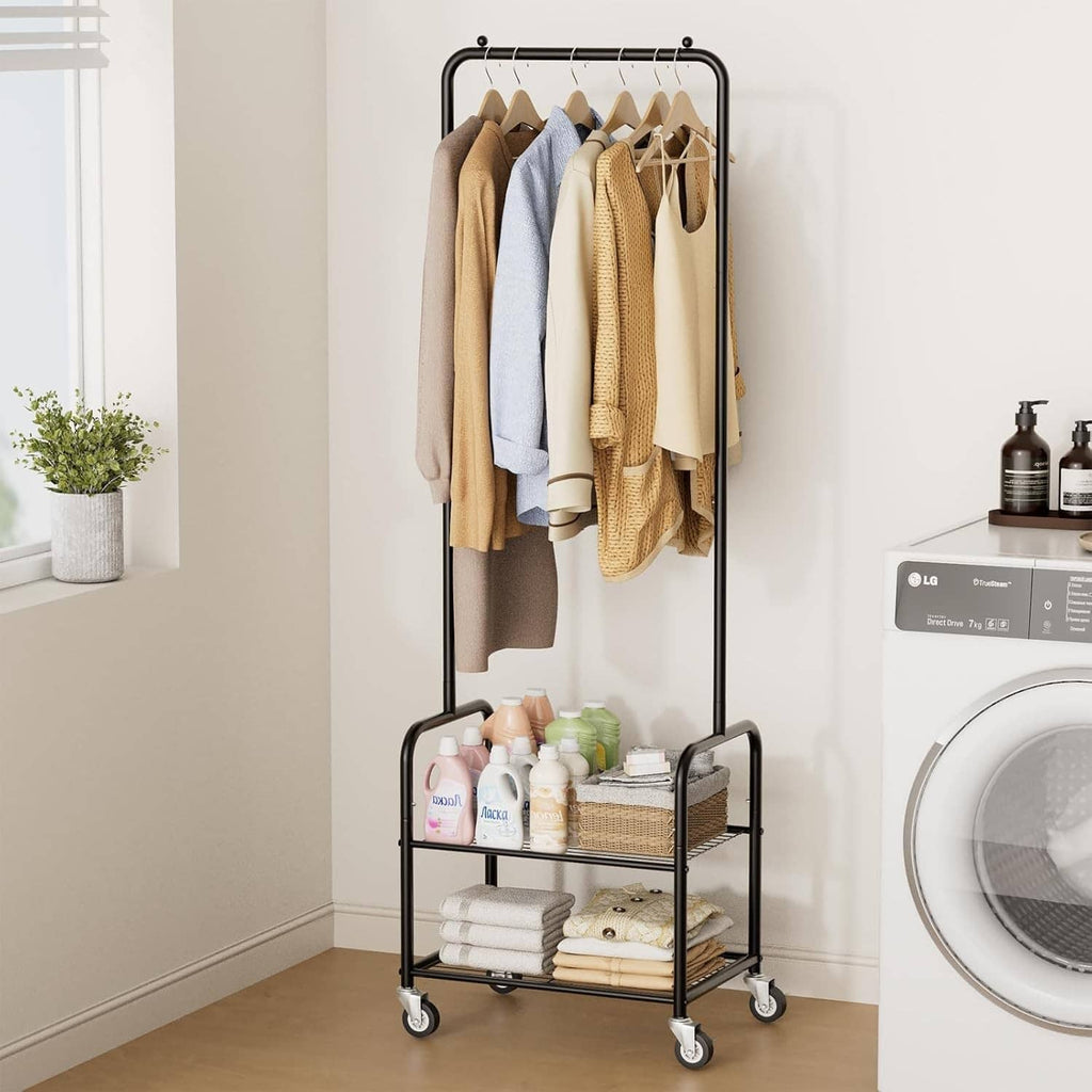 Black metal rolling clothes rack with hanging bar and two shelves, towels and bottles