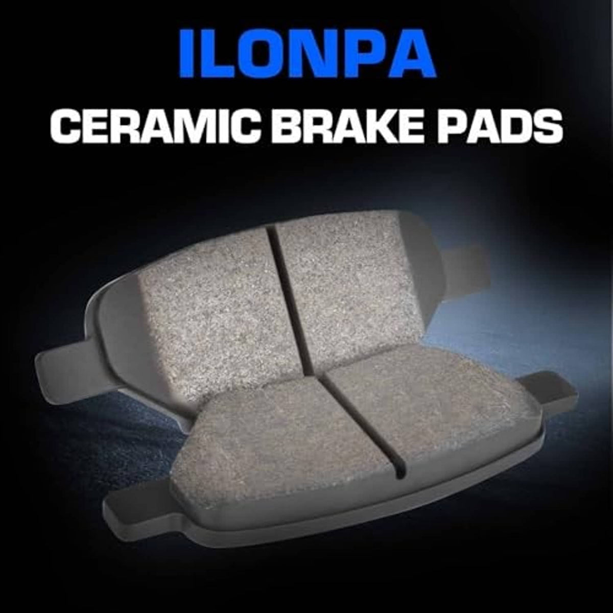Ceramic brake pads close-up with two gray friction blocks and curved backing