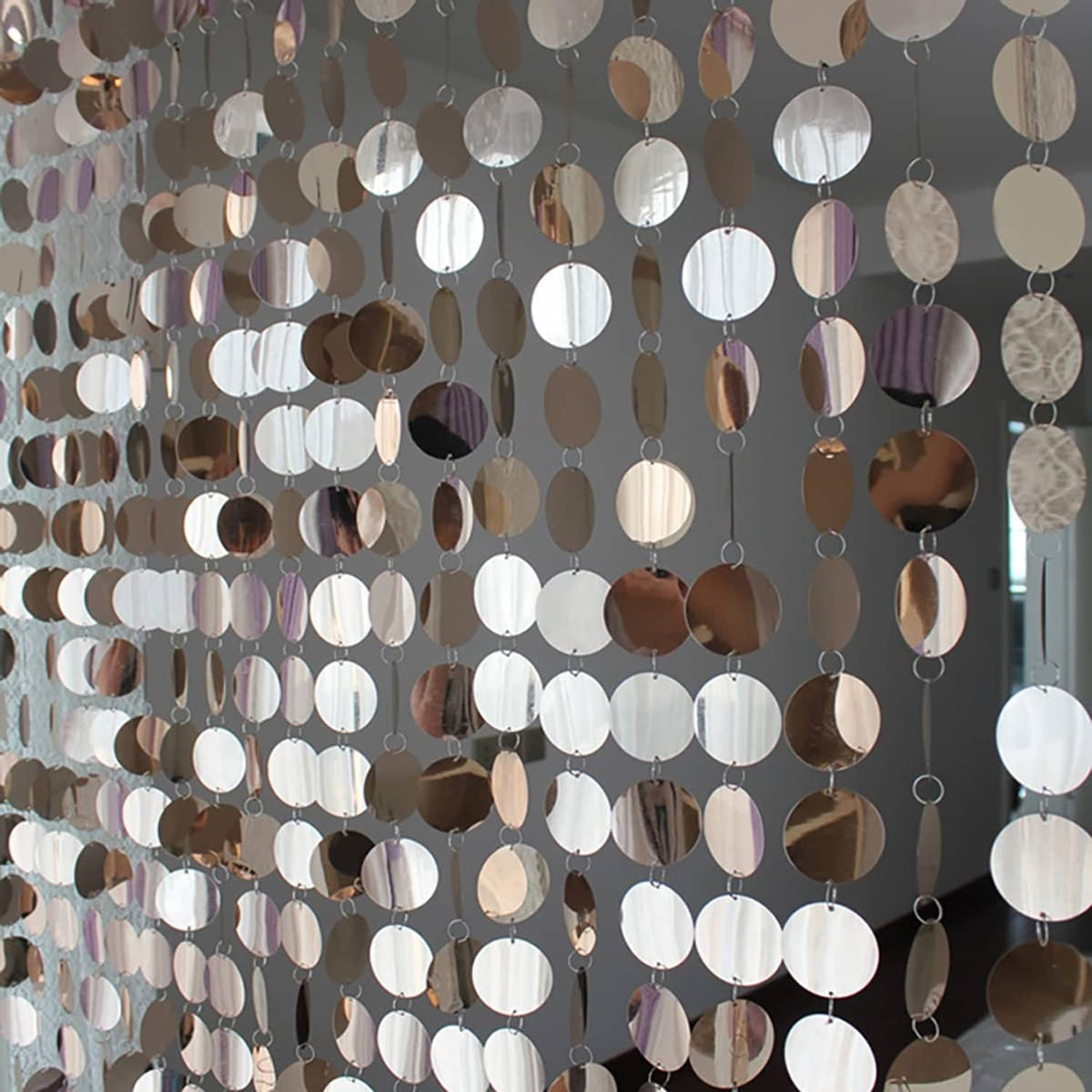 Champagne sequin beaded door curtain with round metallic discs hanging in rows