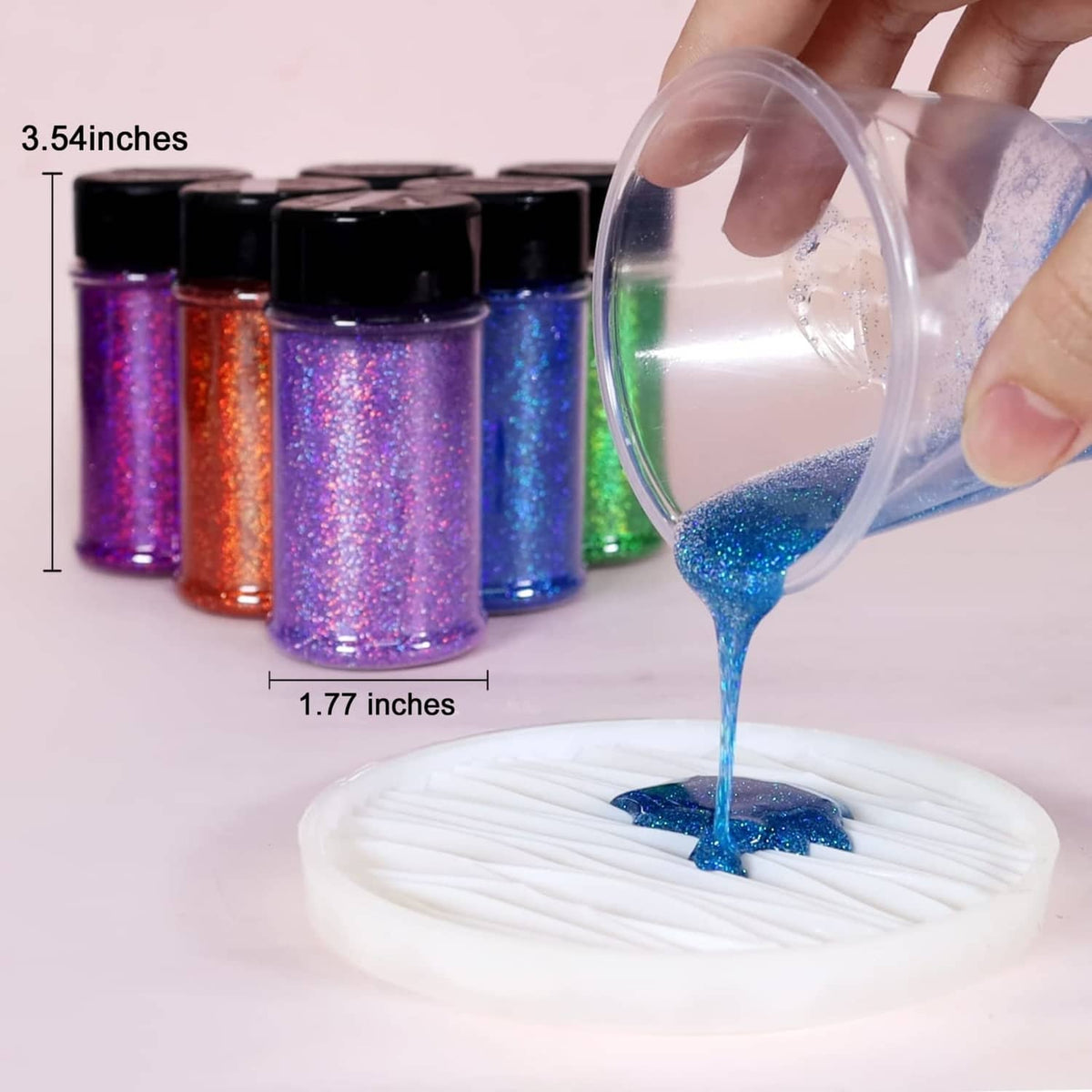 Holographic ultra fine glitter powder being poured into clear resin for craft use