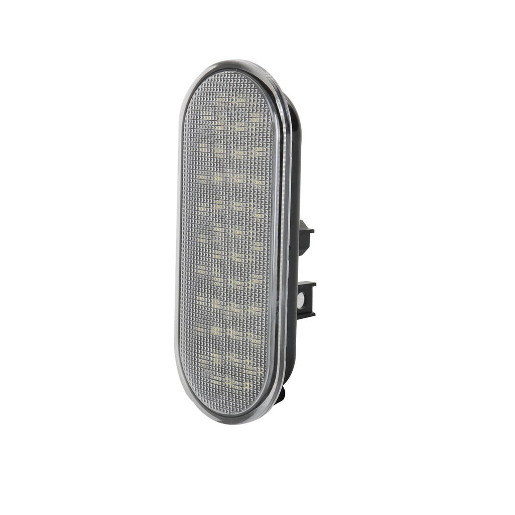Side view of oval LED bed light lens with black outer housing and clips