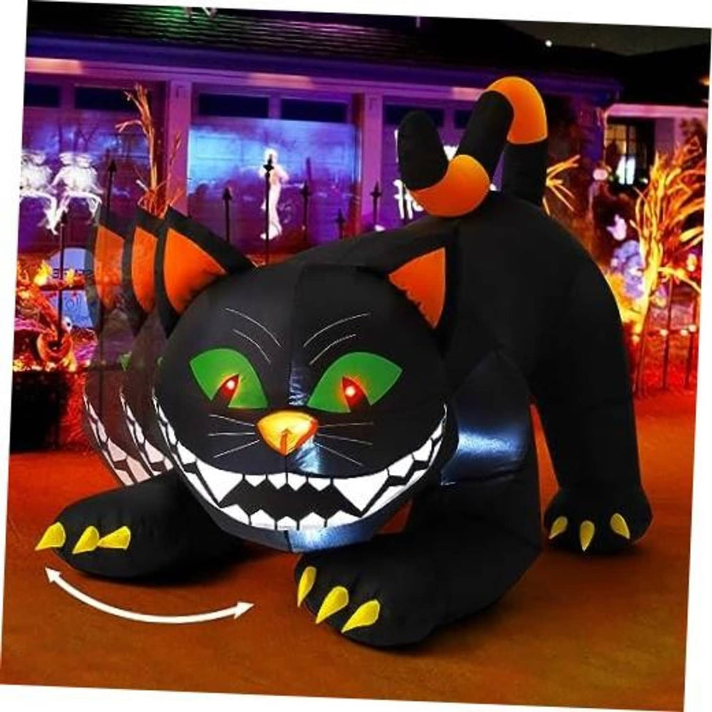 Inflatable black cat yard decoration with orange ears and glowing green eyes
