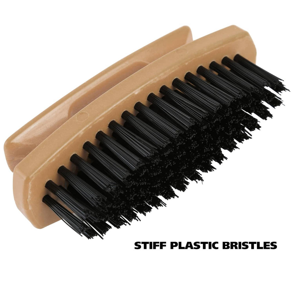 Nail brush with stiff black plastic bristles on tan handle