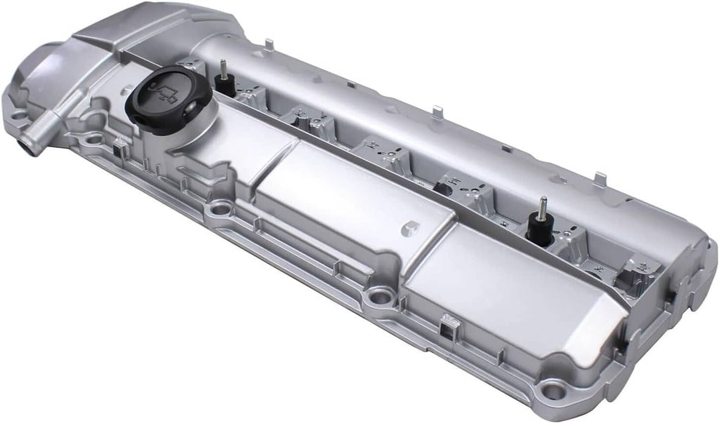 Aluminum valve cover in metallic silver with black oil cap on top corner