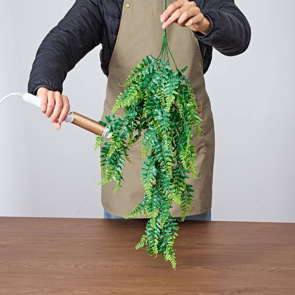 Artificial hanging Boston fern bush with cascading bright green leaves