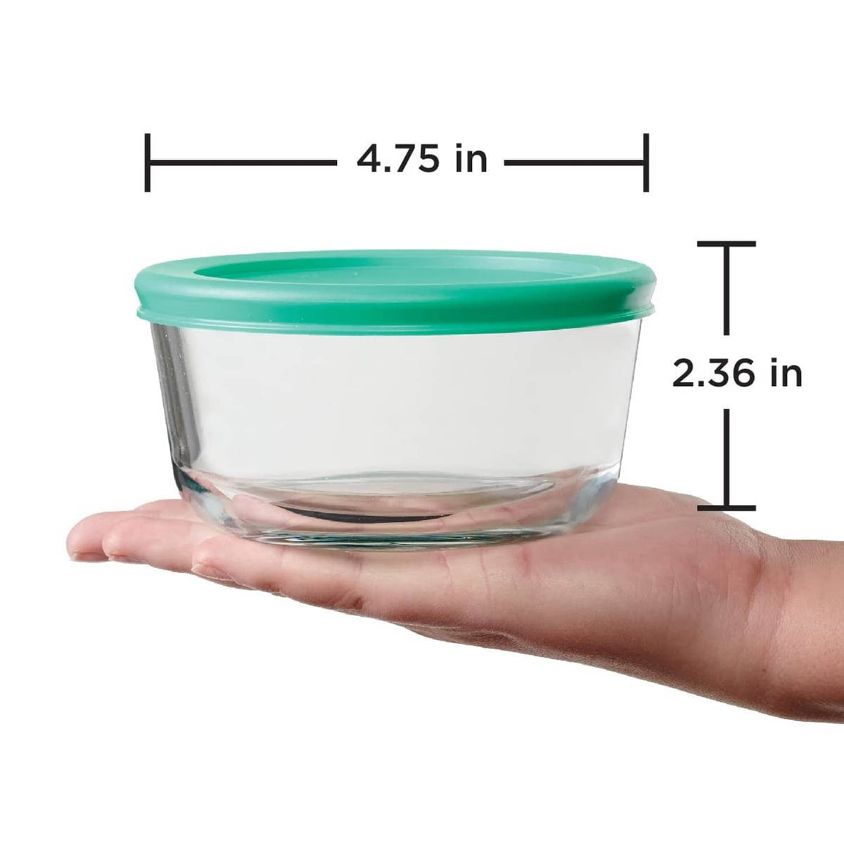 Round glass storage container with teal lid, shown held with size markings