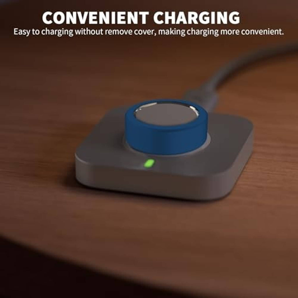Blue silicone smart ring cover placed on a charging base with indicator light