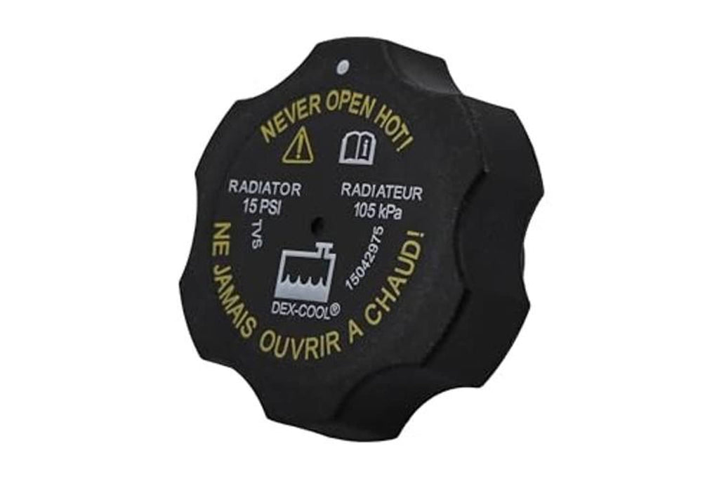 Black radiator cap with multilingual warning icons and 15 PSI labeling