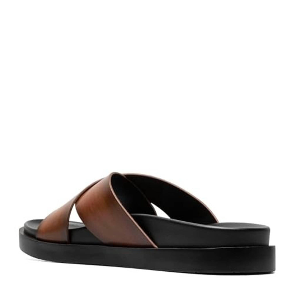 Cognac brown slide sandal open view showing black lining and wide cross strap