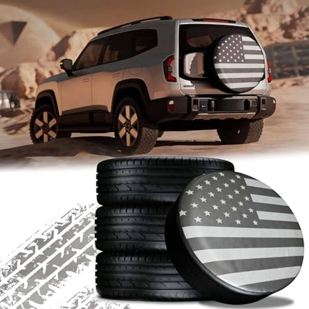 Spare tire cover with American flag stars and stripes over stacked black tires.