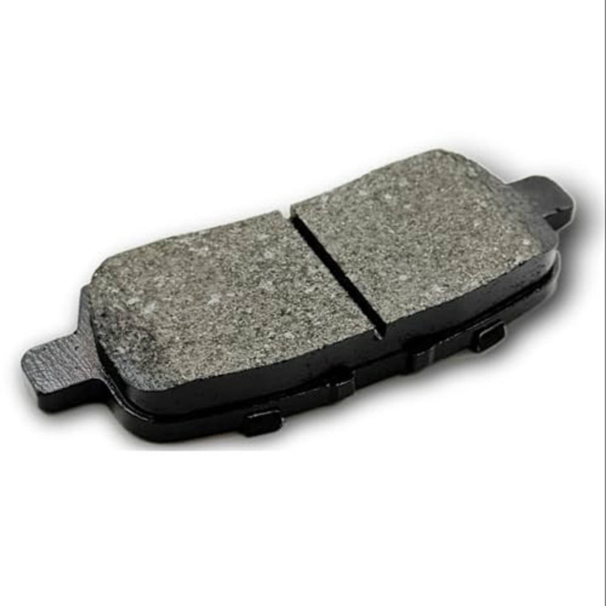 Ceramic brake pad with gray friction surface and black backing, side angle view.