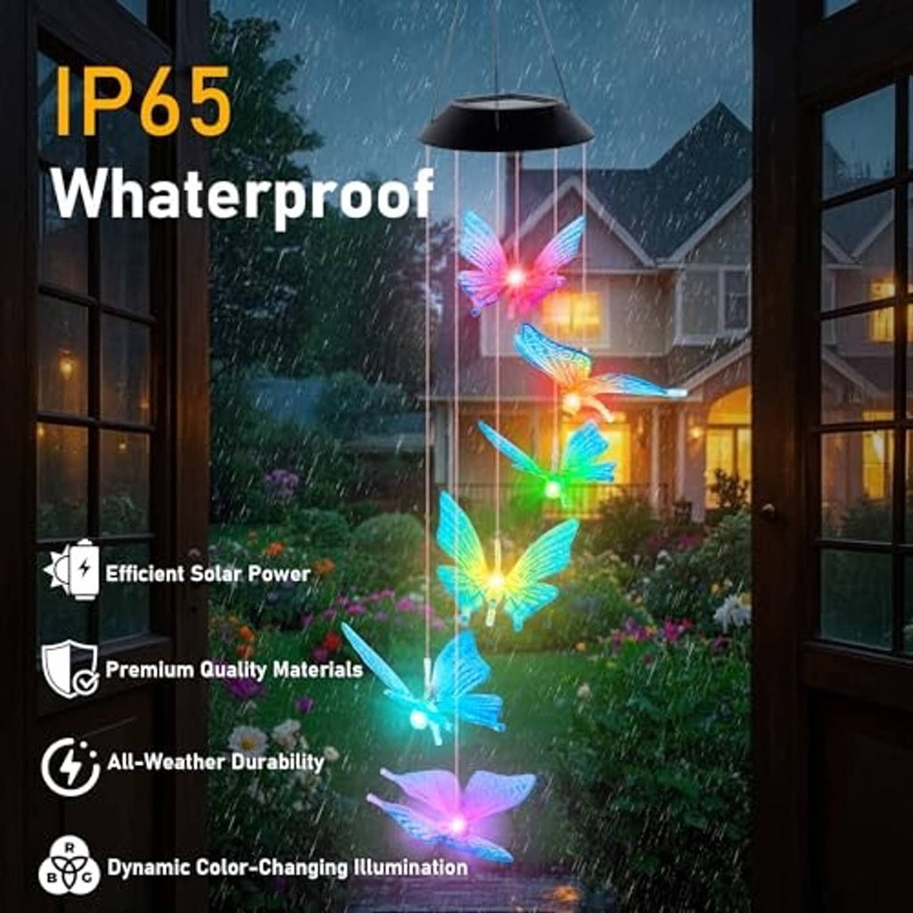 Solar butterfly wind chime with color-changing LED butterflies glowing outdoors