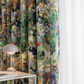 Floral green curtain panels with multicolor botanical print, pleated folds