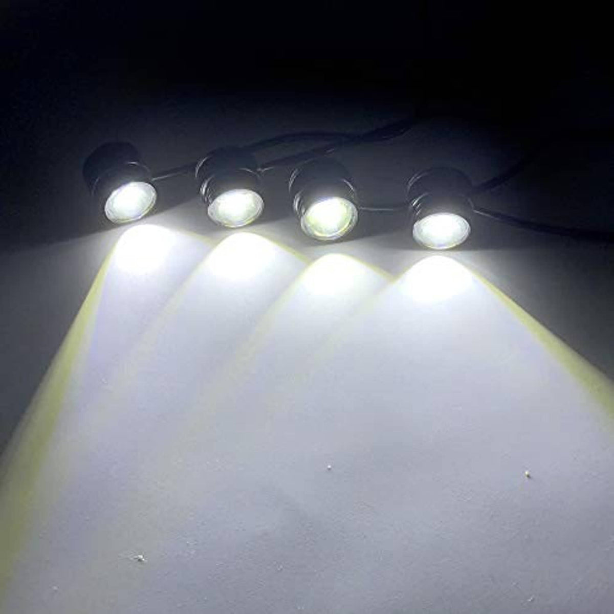 Four front-facing LED strobe bulbs shining brightly from a compact mount