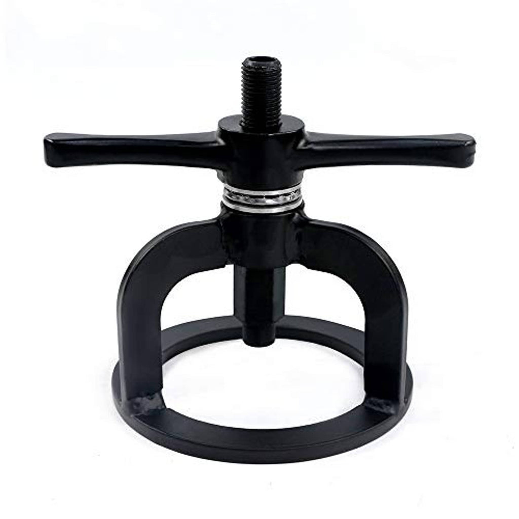 Black spring compressor tool with top cross handle and threaded center bolt