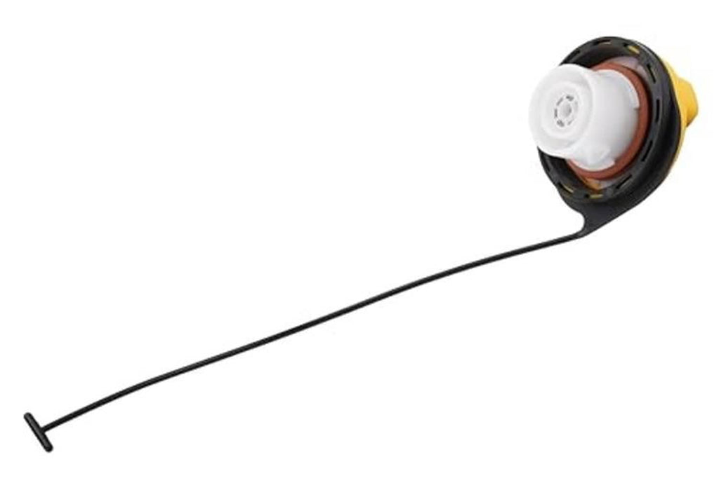 Fuel tank filler cap with black housing and white gasket underside, yellow rim