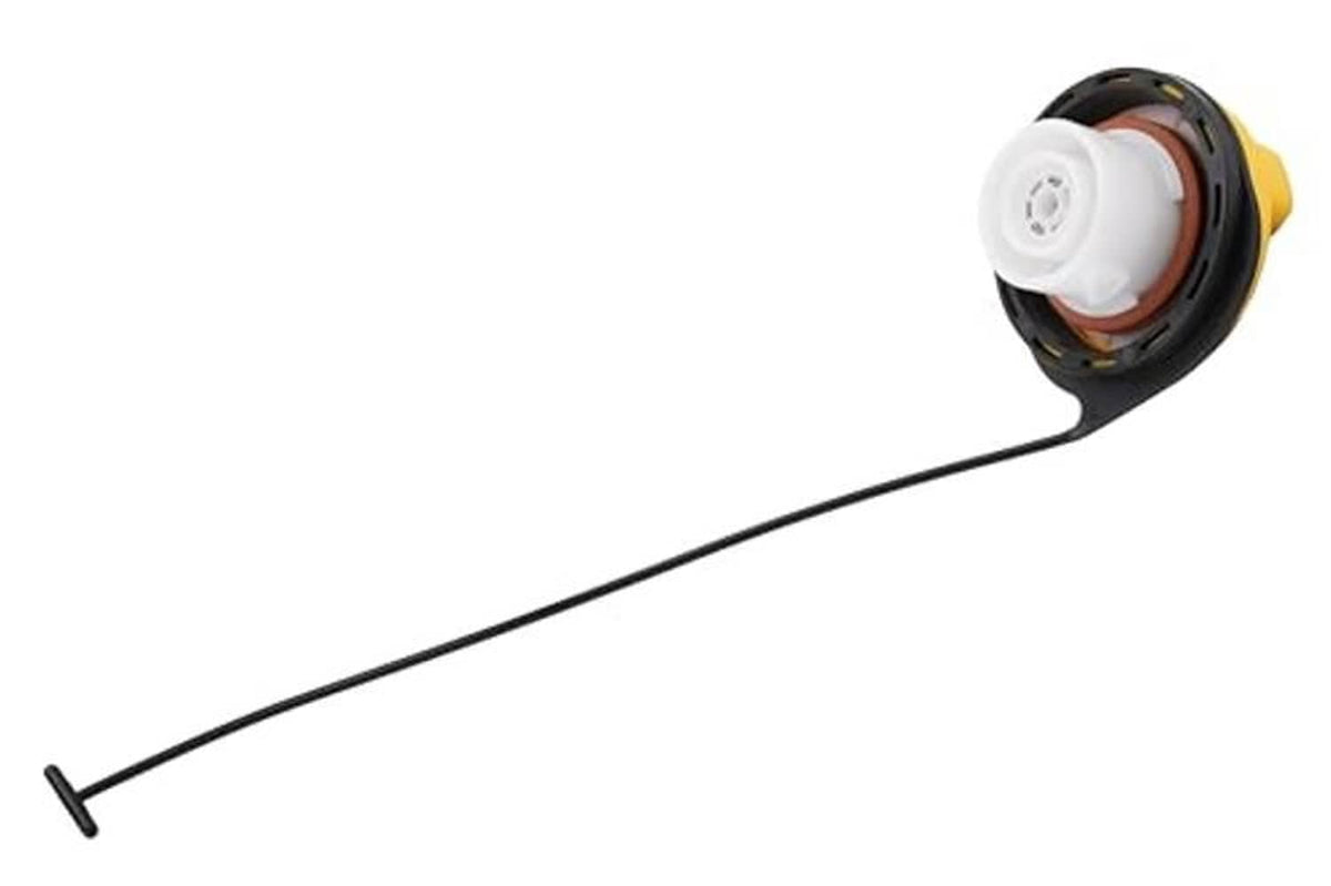Fuel tank filler cap with black housing and white gasket underside, yellow rim