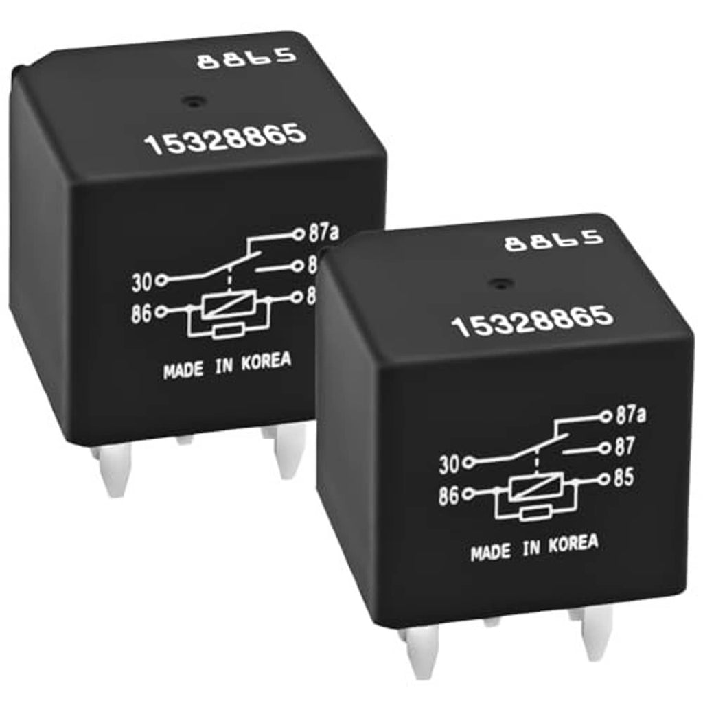Pair of black 5-pin automotive relays with 15328865 markings and contact diagram