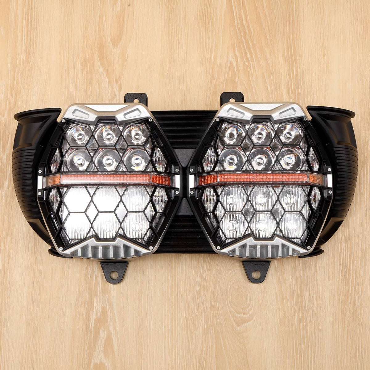 Dual LED projector headlights front view with amber bar and hexagonal lens lights