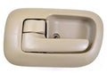 Beige interior door handle trim with recessed pull and latch opening