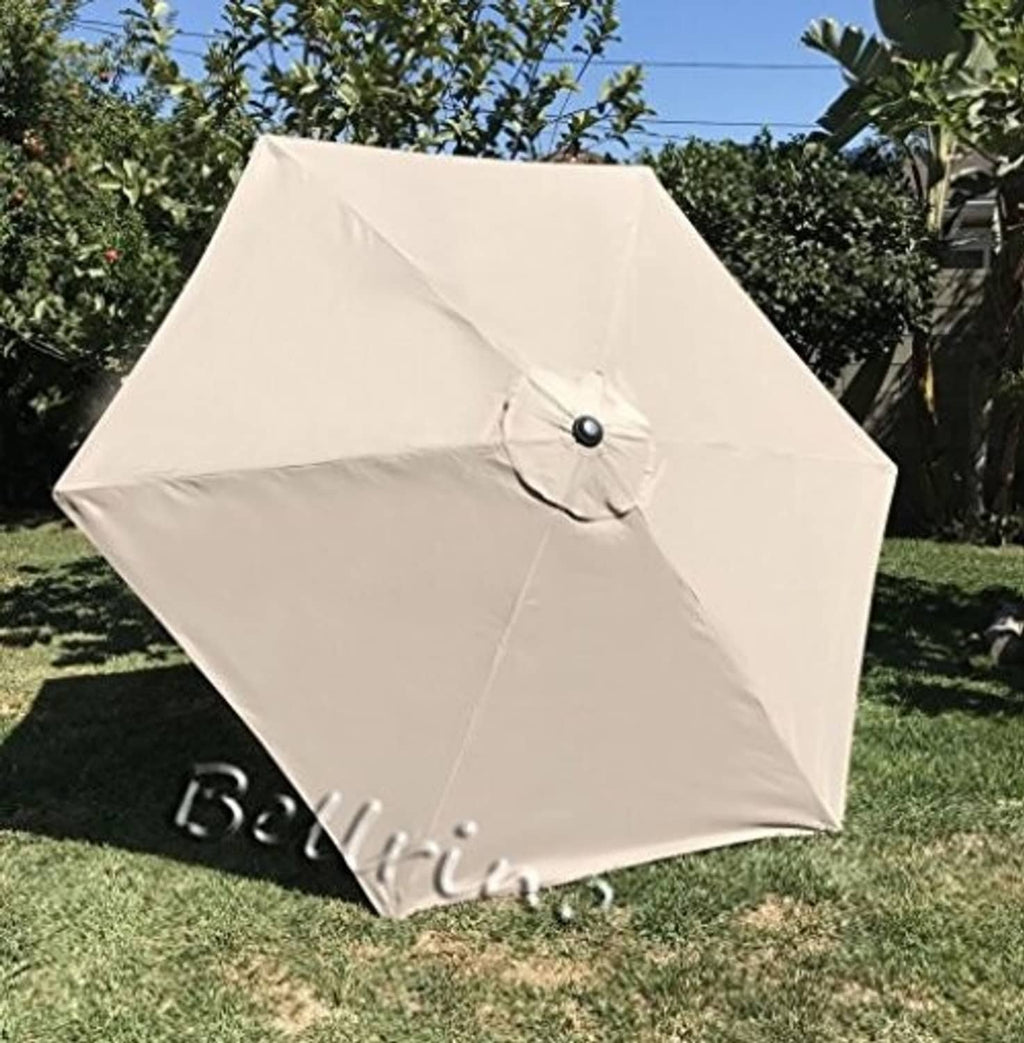 Off-white umbrella canopy replacement cover with central button and pleated fabric panels