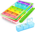 Large weekly pill organizer with hinged clear lid, rainbow day sections, and separate tray