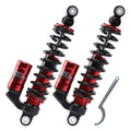 Pair of front motorcycle shocks with black springs and red aluminum reservoirs