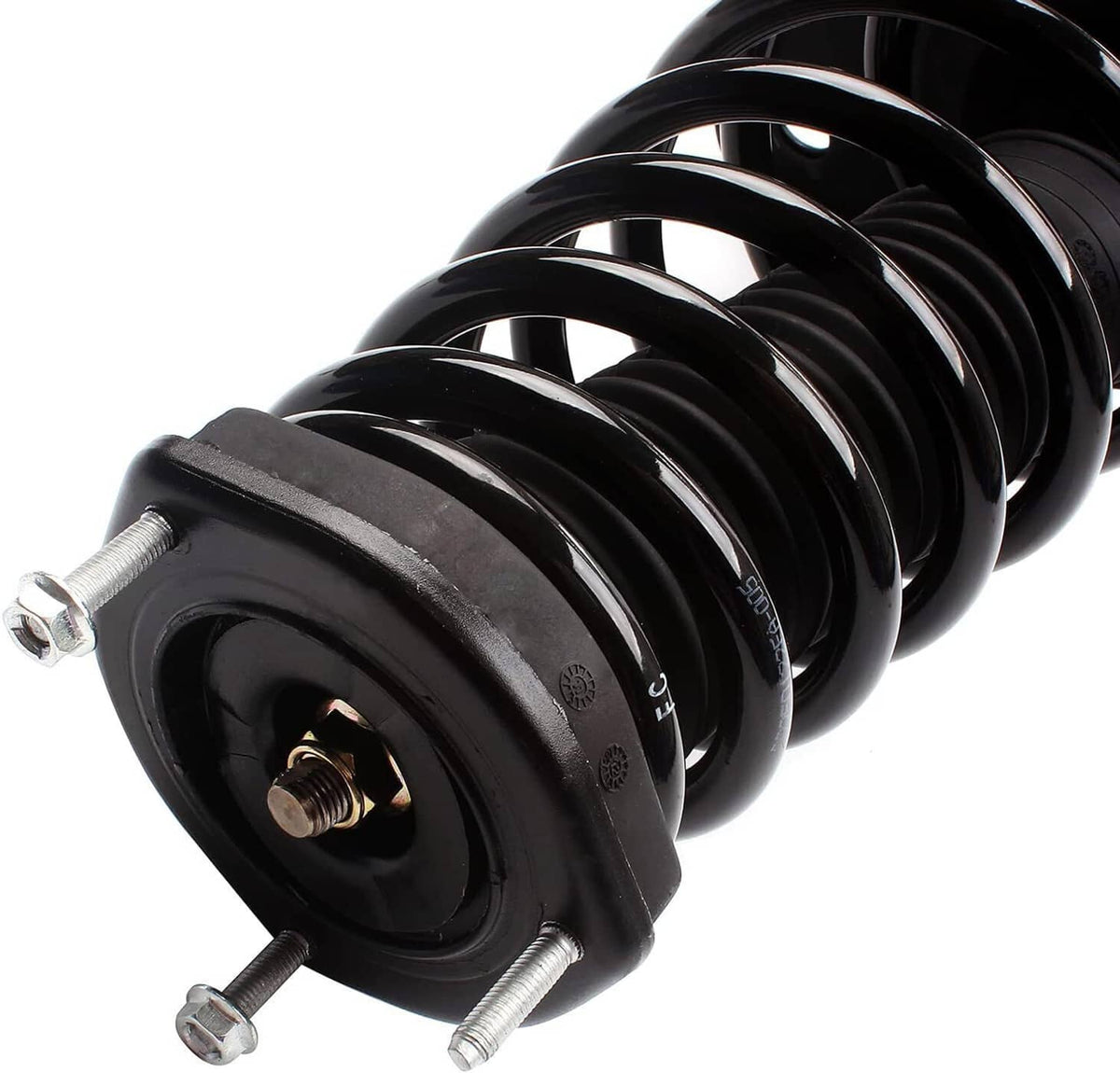 Close-up shock strut with black coil spring and top mount hardware