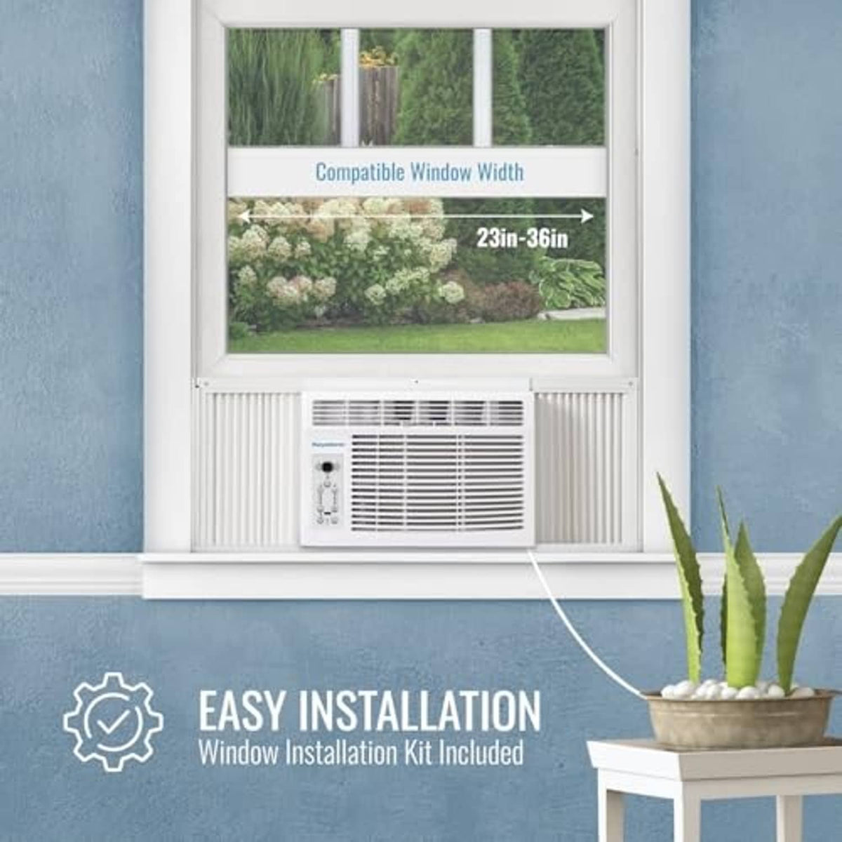 White window air conditioner with front grille and control panel installed
