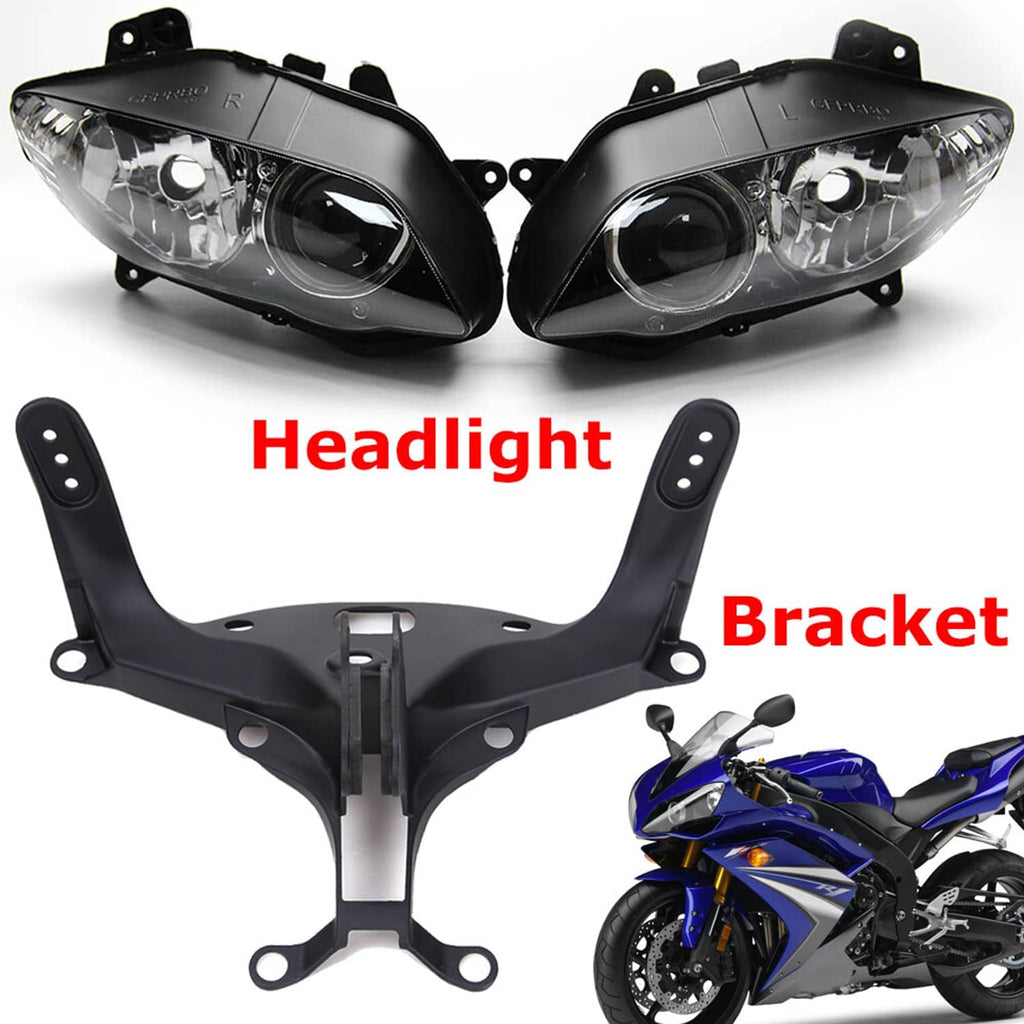 Dual headlight housings plus upper bracket frame for front fairing, black mounting pieces
