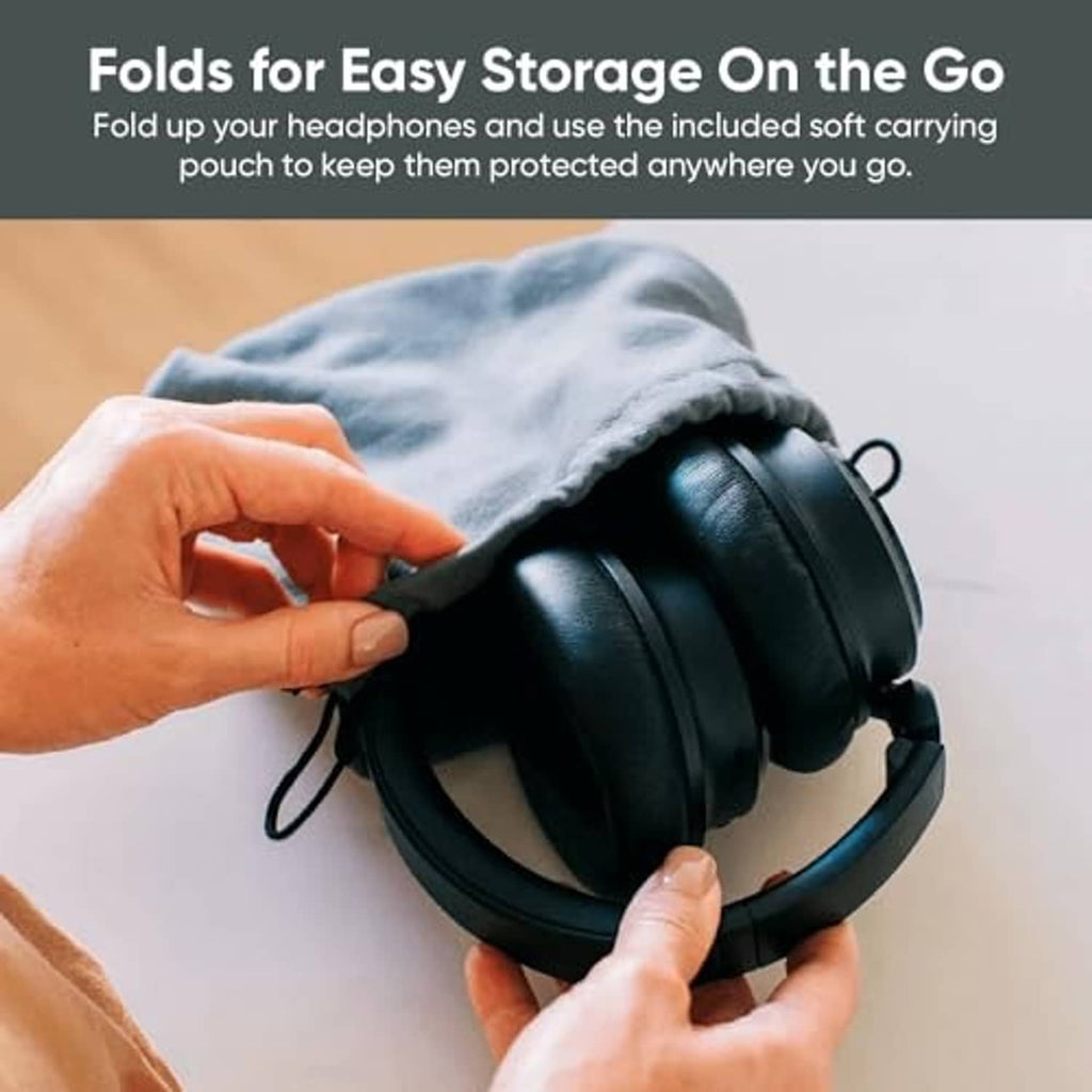 Foldable over-ear wireless noise-cancelling headphones held by hands while adjusting.