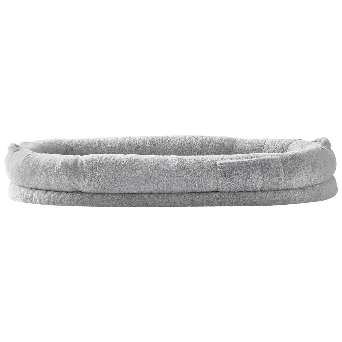 Grey oval dog bed profile with padded plush rim and smooth outer fabric.