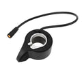 Black thumb throttle with circular mounting ring and cable with orange-tipped end