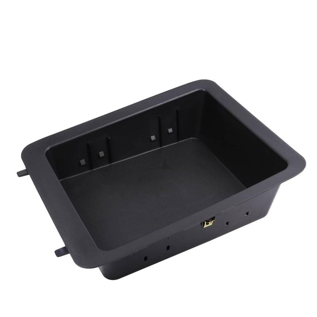 Black plastic center console tray insert with mounting tabs and side outlets