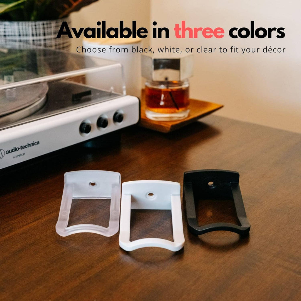 Adhesive hat wall hooks in black, white, and clear finishes