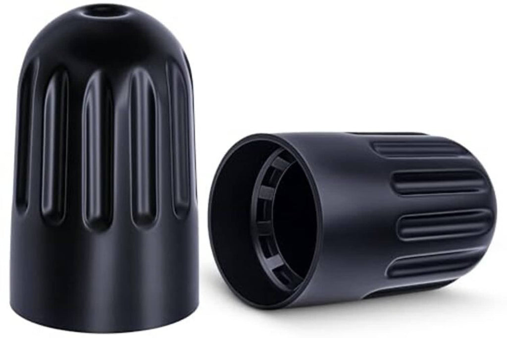 Black TPMS long-stem tire valve cap with ribbed vents, angled view of two caps