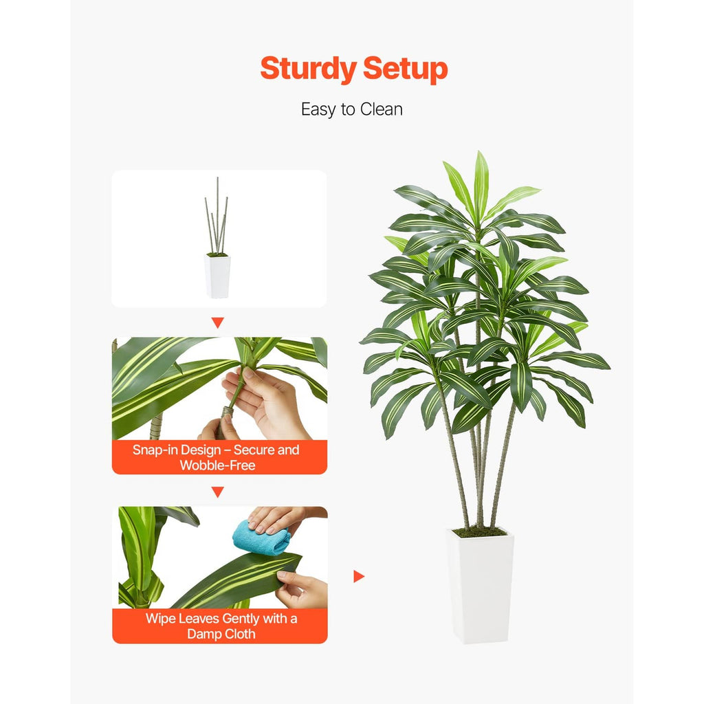 Faux dracaena tree in a white pot with three trunk stems and green leaf clusters