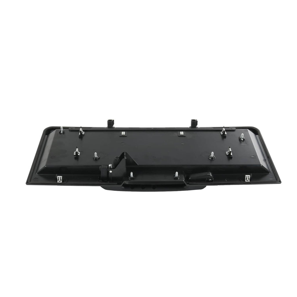 Back view of tailgate license pocket with mounting hardware and central handle, black plastic