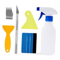Vinyl wrap smoothing kit with blade scraper, colored handles, and spray bottle