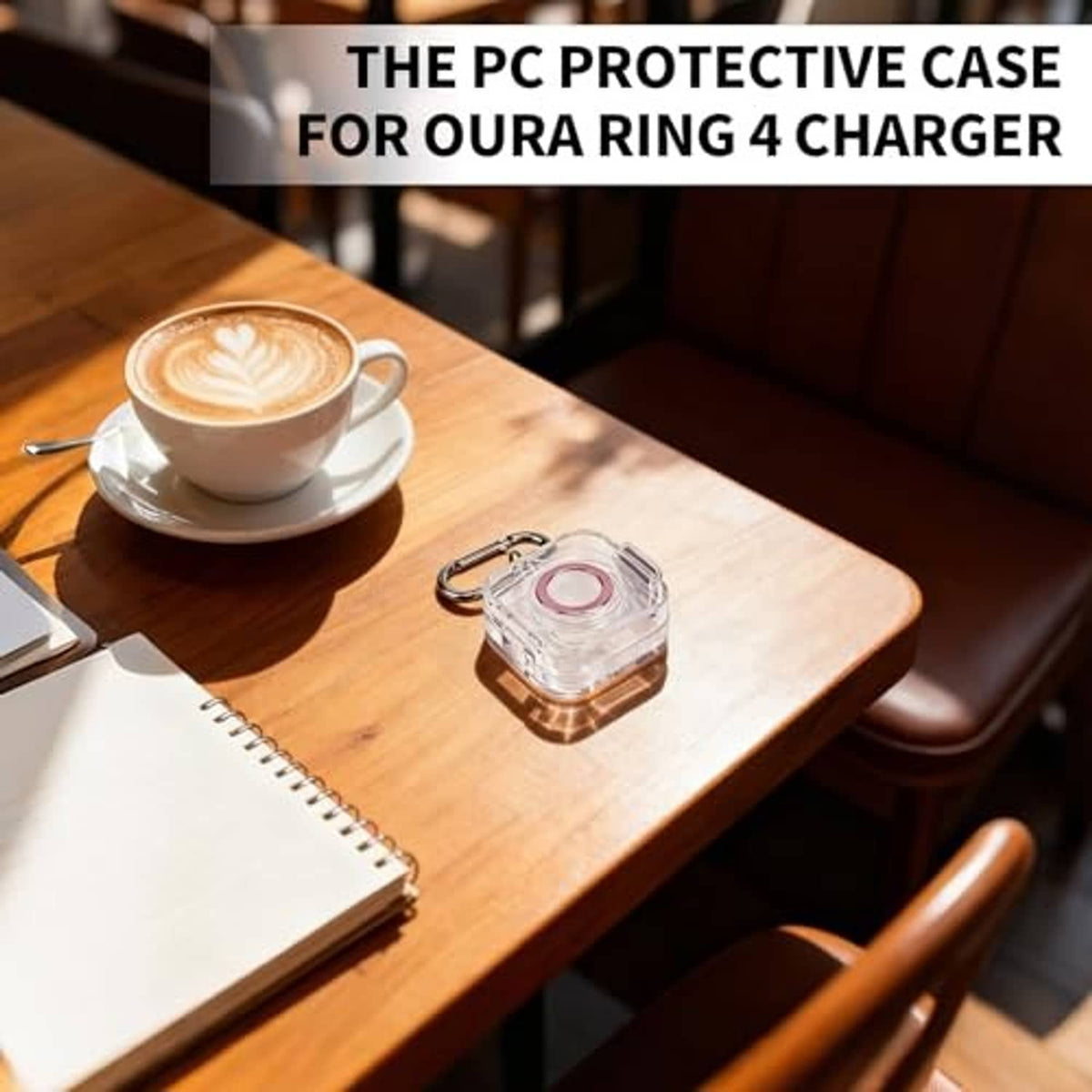 Clear protective charger case with red charging contact on wooden table with carabiner
