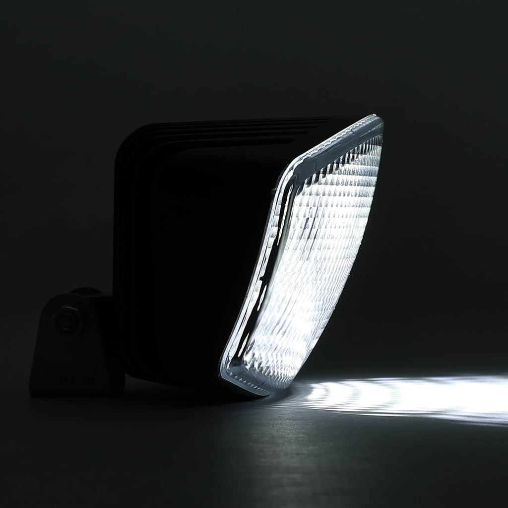 Lit LED cab roof marker light from the side, clear lens with dark housing