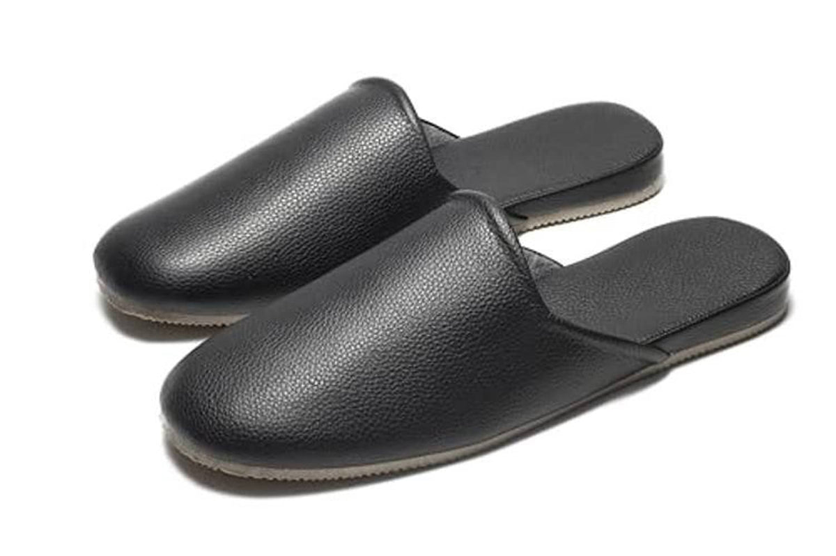 Black leather slip-on slippers, two shoes side by side with open heel