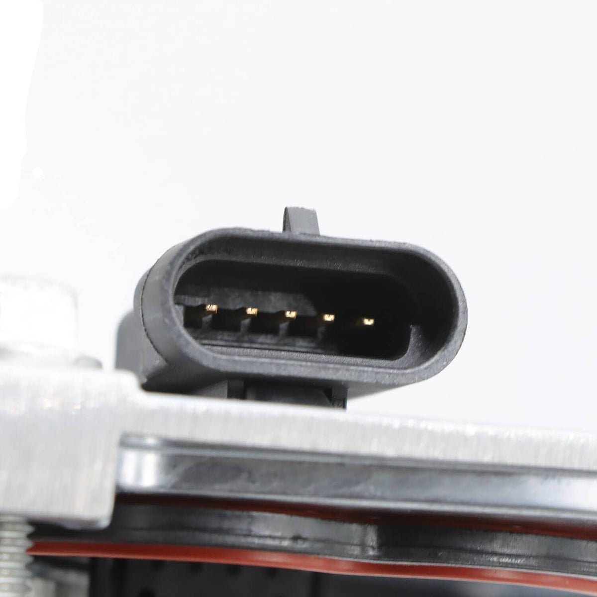Valve cover electrical connector with pin cavity on silver metal housing