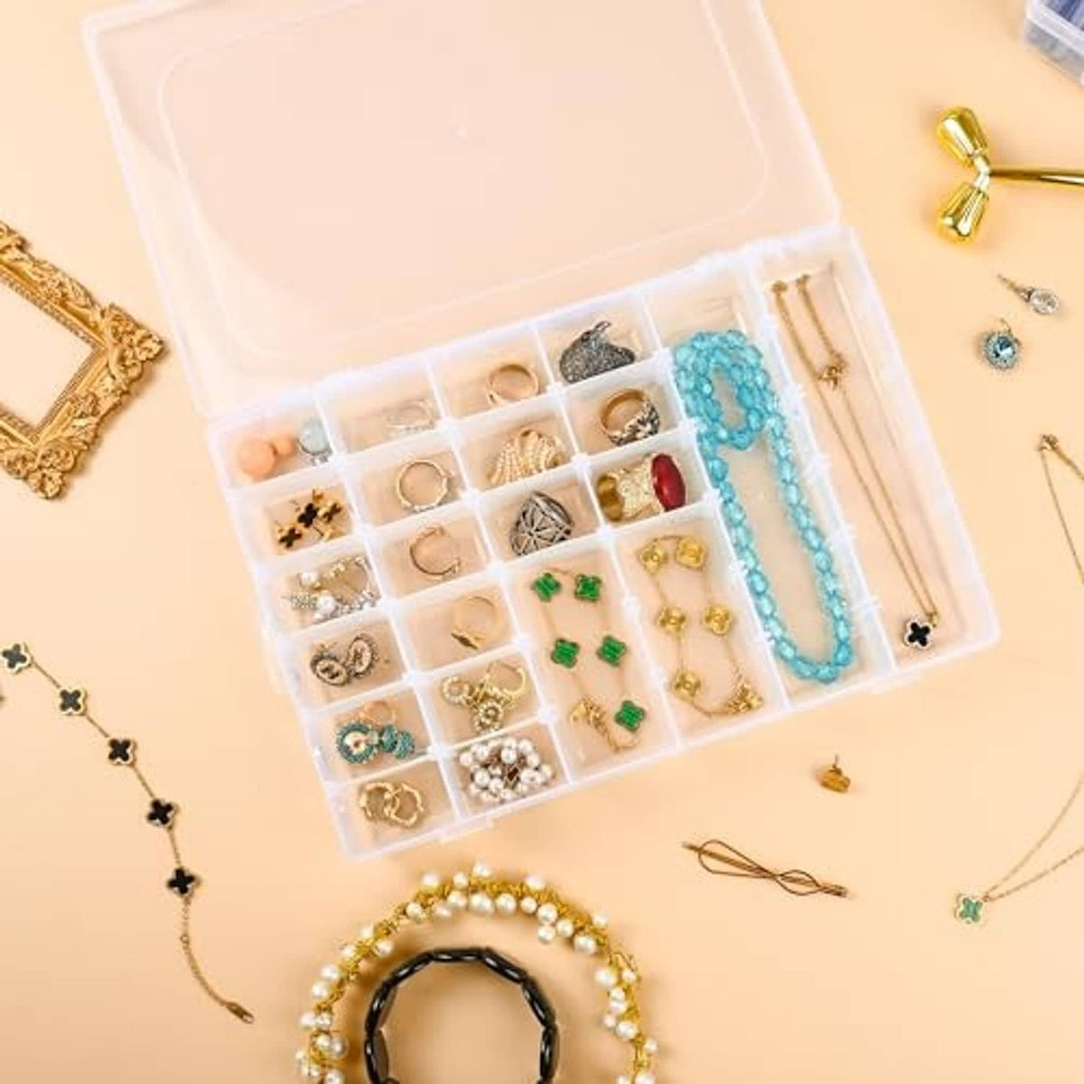 Clear plastic grid organizer box with small jewelry items stored in divided compartments